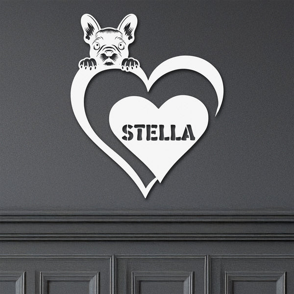 White metal sign featuring a pug and a heart-shaped name plaque, displayed on a dark background.