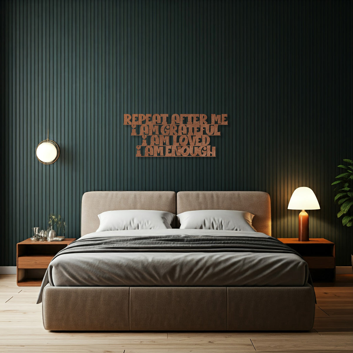 Metal die-cut sign with the phrase 'Repeat After Me I Am Grateful I Am Loved I Am Enough' in a bedroom setting with a modern bed and side tables.