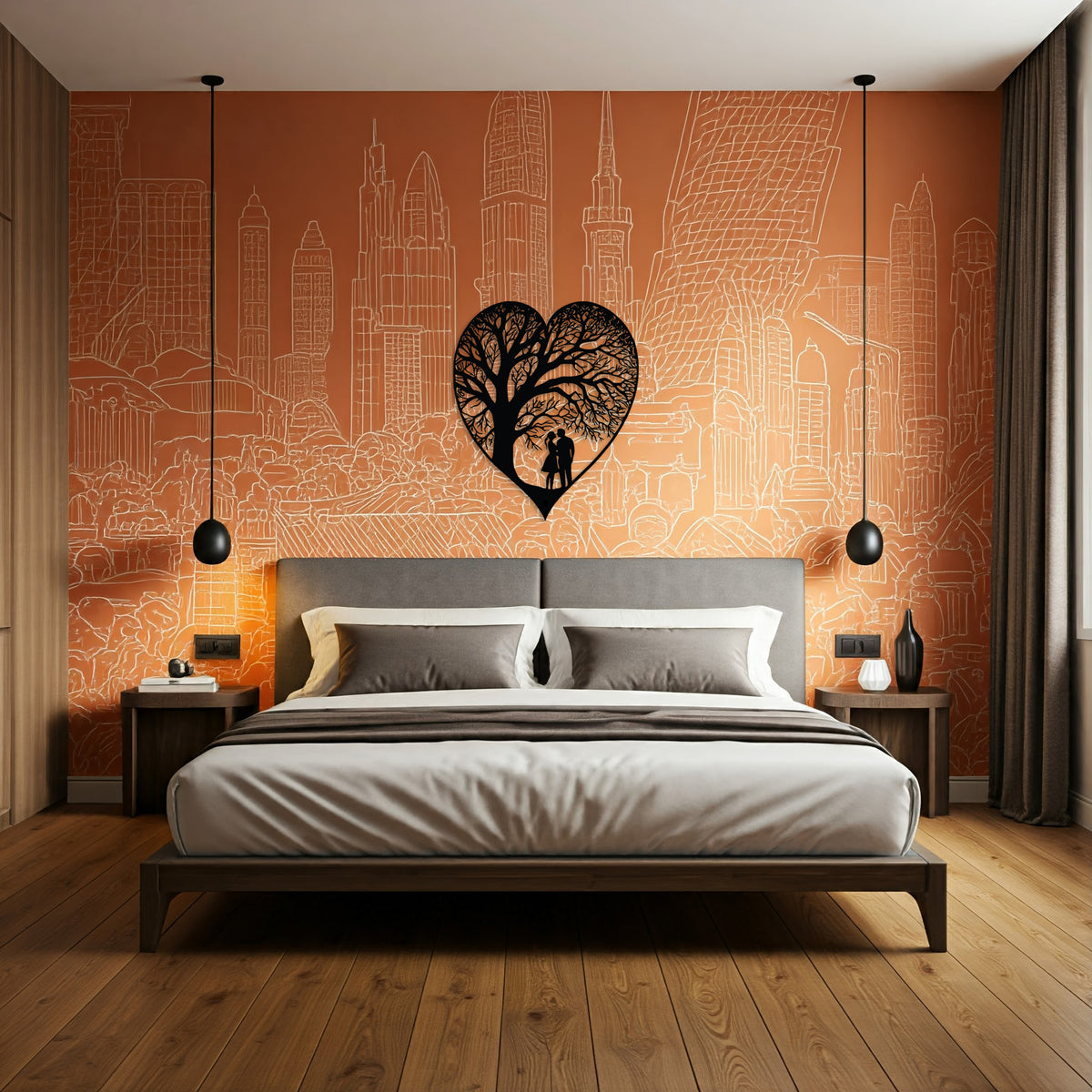 A black and white metal heart-shaped wall decor with a detailed tree-like pattern and two silhouettes of a couple embracing. This is hung over a bed in a modern bedroom.