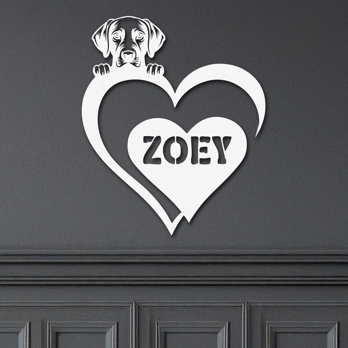 White metal sign featuring a labrador and a heart-shaped name plaque, displayed on a dark background.