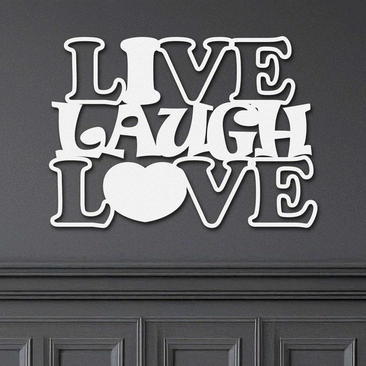 Live Laugh Love metal art sign with a heart symbol for the "o", on a grey wall.