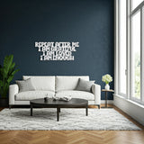 Silver metal die-cut sign with the phrase 'Repeat After Me I Am Grateful I Am Loved I Am Enough' in a living room setting with a white sofa and coffee table.
